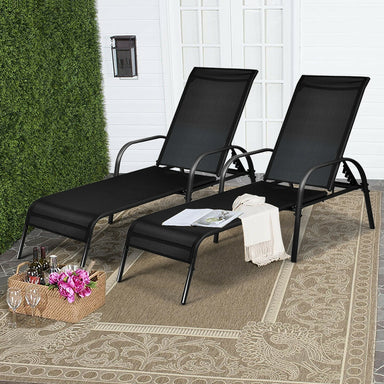 Chic 2-Piece Black Adjustable Reclining Outdoor Patio Chaise Lounge Chairs by Dream Yard Oasis ™ set in a cozy outdoor space, accompanied by a small table and decorative elements.