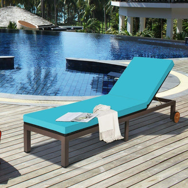 5-Position Adjustable Patio Chaise Lounge Chair – Turquoise Rattan Lounger with Cushions next to a beautiful pool, perfect for outdoor relaxation and sunbathing.