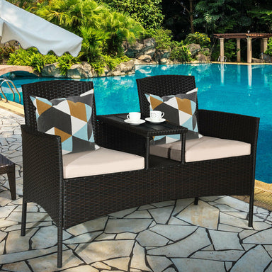 Modern Patio Conversation Set With Coffee Table, Cushions, Rugged PE Rattan, Beige in a scenic outdoor setting by the pool.