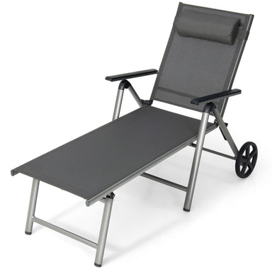 Close-up view of the 7-Level Adjustable Folding Patio Chaise Lounge Chair with Wheels featuring quick-dry fabric and removable pillow for added comfort in any outdoor setting.