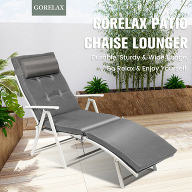 Adjustable Lightweight Folding Chaise Lounge Chair with Removable Pillow & Cushions - Gray, featuring a stylish design and sturdy construction, set in a lush outdoor environment.