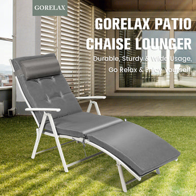 Adjustable Lightweight Folding Chaise Lounge Chair with Removable Pillow & Cushions - Gray, showcased in a modern patio setting, perfect for relaxation and sunbathing.