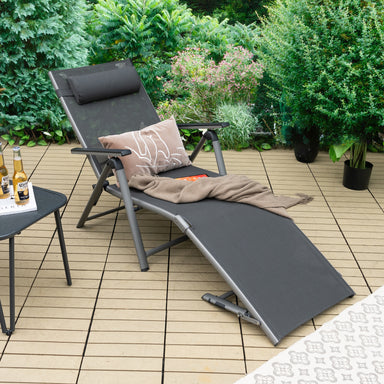 Adjustable Outdoor Aluminum Chaise Lounge Chair with Quick-Drying Fabric & Removable Pillow in a beautiful outdoor setting, featuring a blanket and cushions for extra comfort.