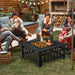 32-Inch 3-In-1 Outdoor Square Fire Pit Table with BBQ Grill, Ice Bucket & Rain Cover being used by friends enjoying BBQ grilling and roasting marshmallows around a warm fire in a backyard setting.