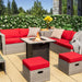 Outdoor setting featuring the 30-inch square propane gas fire pit table with ceramic tabletop among red cushioned seating, creating a warm gathering space.
