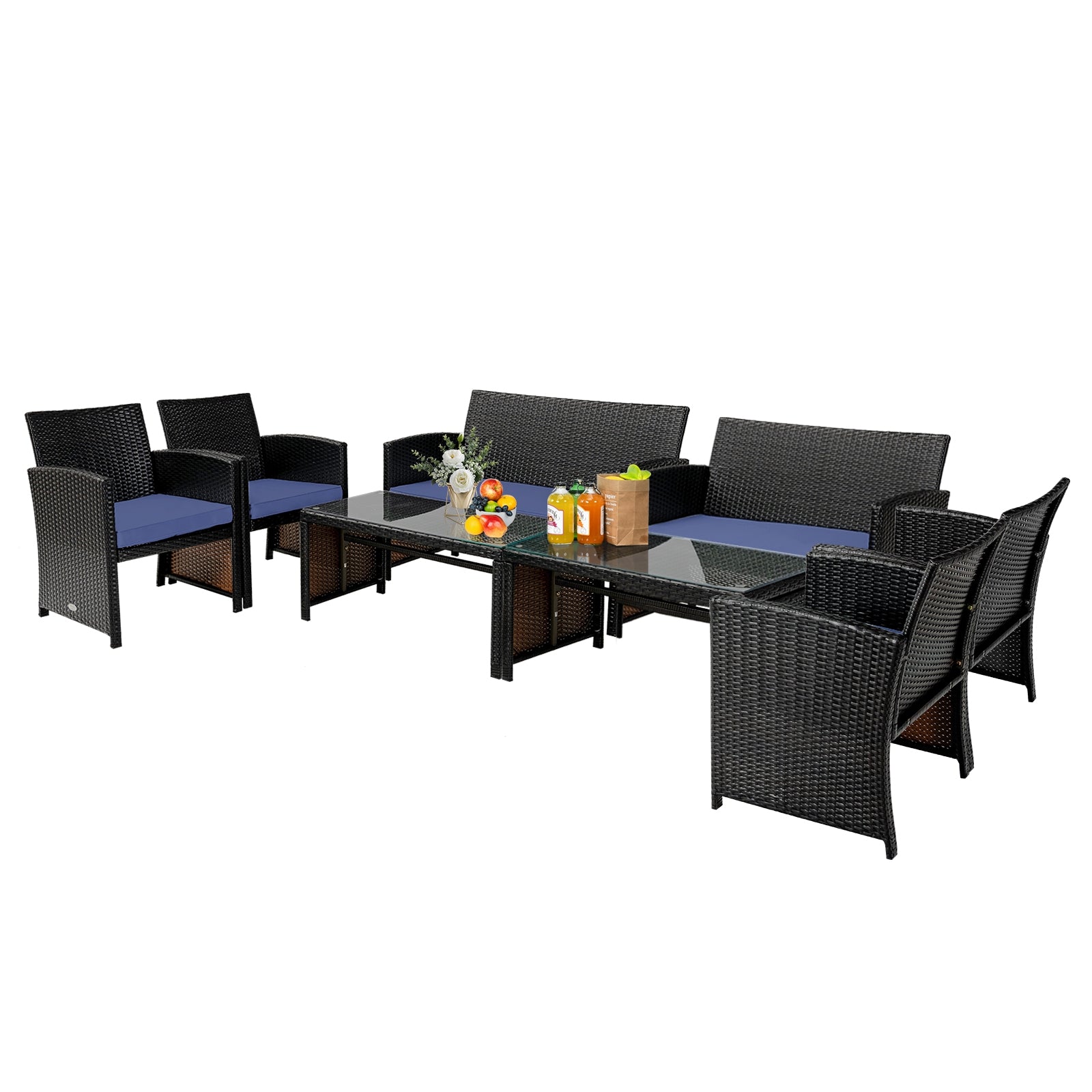 Expanded view of the 4-Piece Navy Cushioned Rattan Patio Furniture Set with Coffee Table for Indoor/Outdoor Use, showcasing a loveseat and chairs with drinks and fruit on the table.