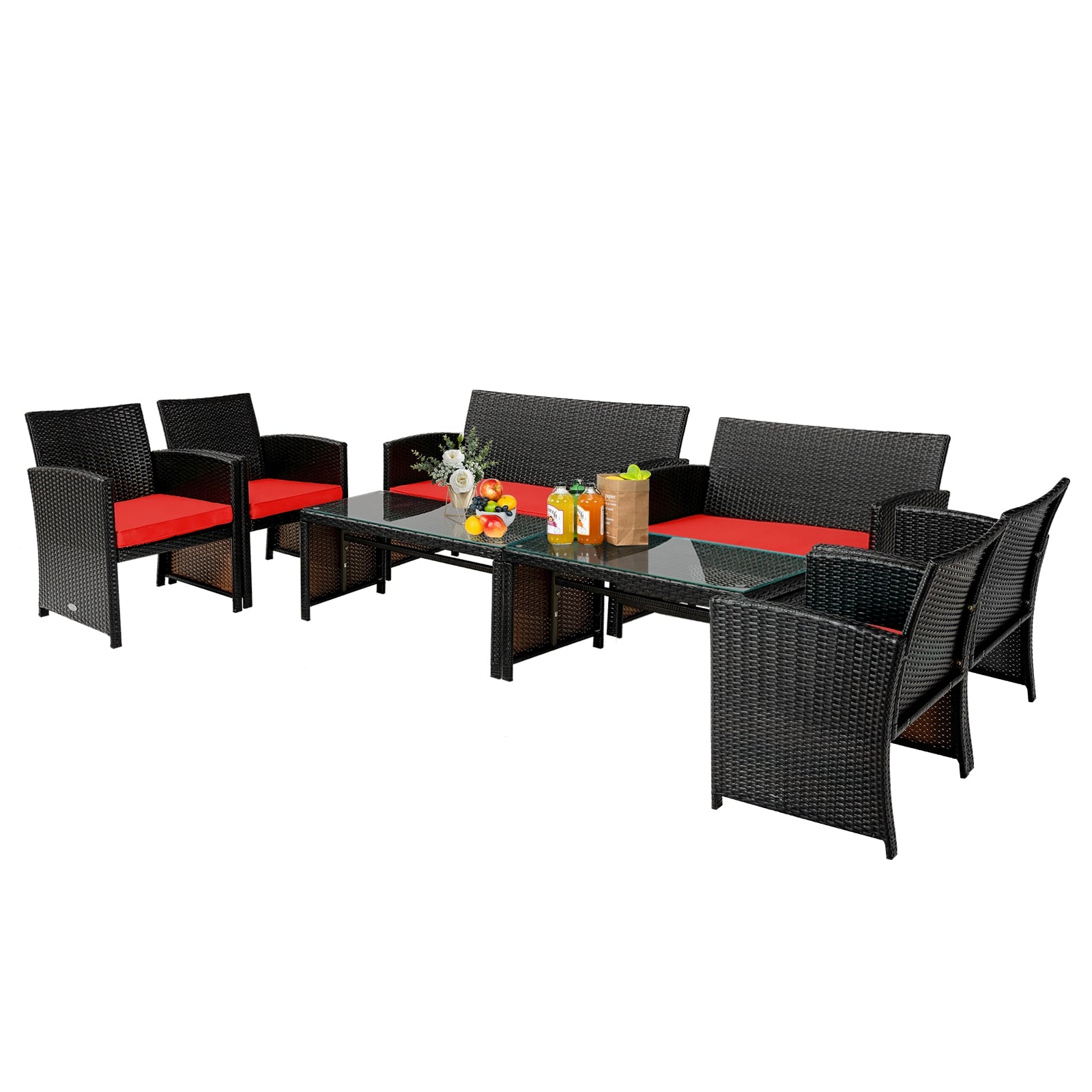 Comprehensive view of the 4 Piece Rattan Outdoor Cushion Furniture Set with Red Cushions, featuring a glass table and set in an inviting outdoor space.