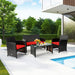 Stylish 4 Piece Rattan Outdoor Cushion Furniture Set with Red Cushions in a serene patio setting, perfect for enjoying sunny days.