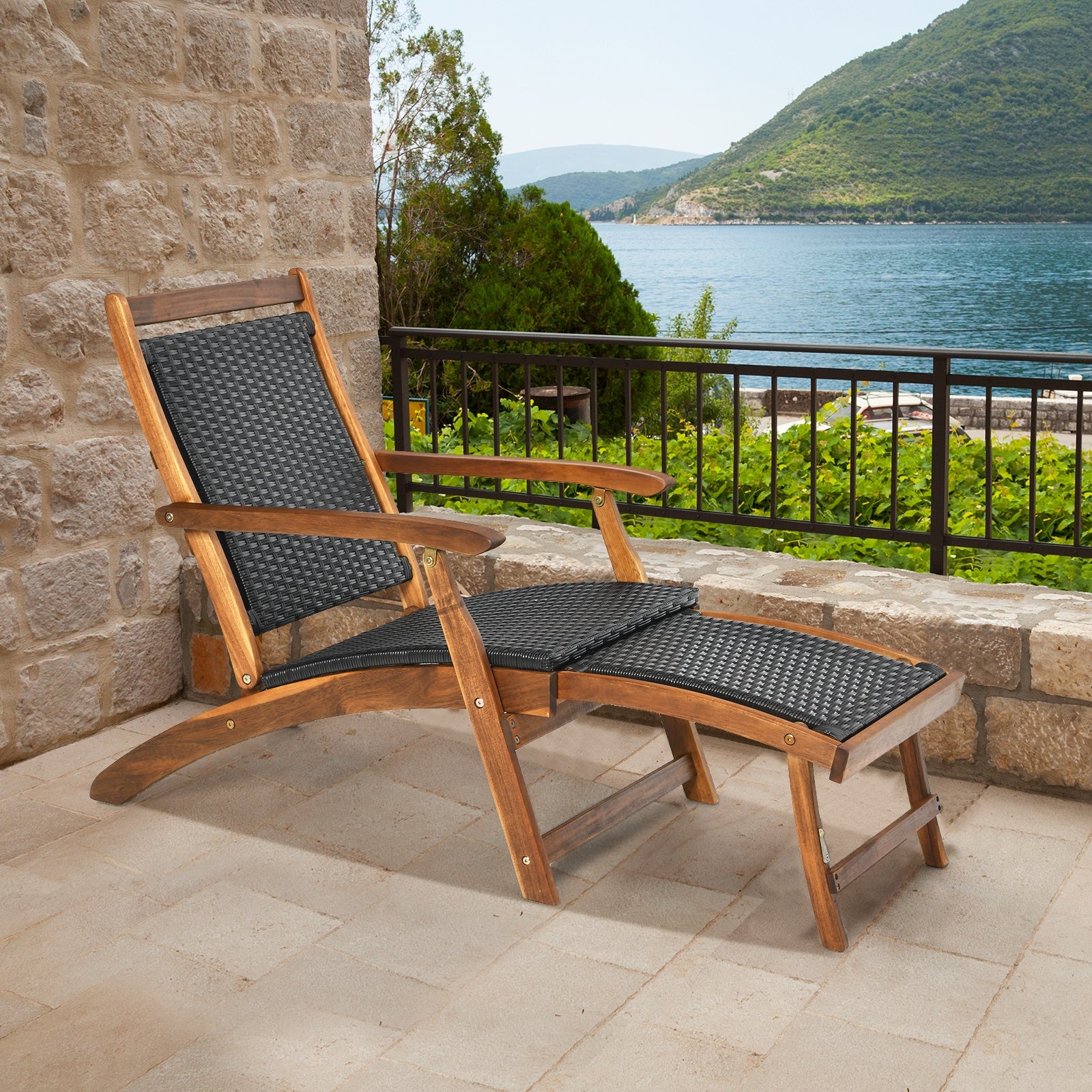 Patio Rattan Folding Lounge Chair in an outdoor setting by Dream Yard Oasis - A charming rustic design with a stunning view, perfect for relaxing on the patio or by the pool.