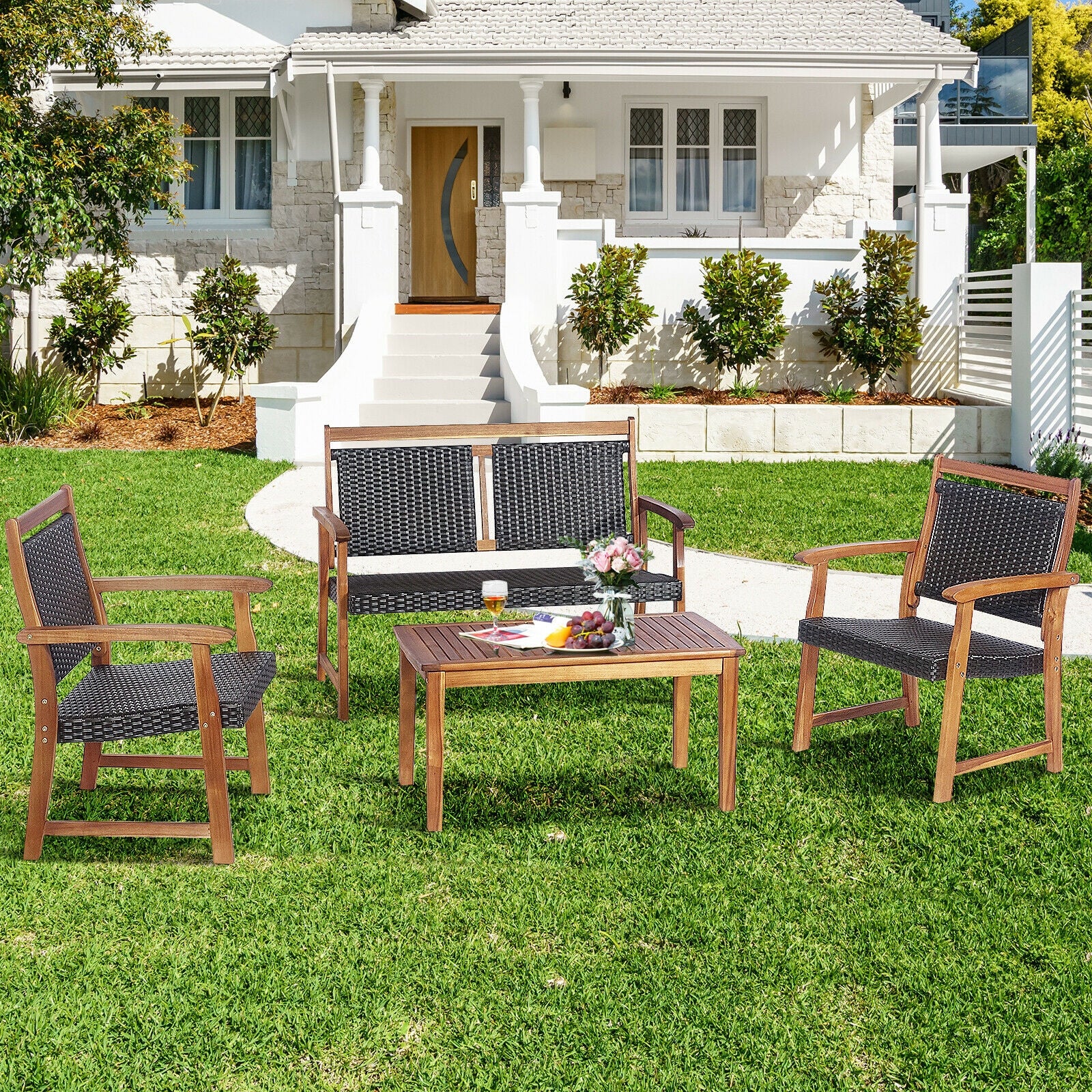 4-Piece Acacia Wood Frame Outdoor Rattan Sofa Set by Dream Yard Oasis ™, beautifully positioned in a backyard with lush greenery.