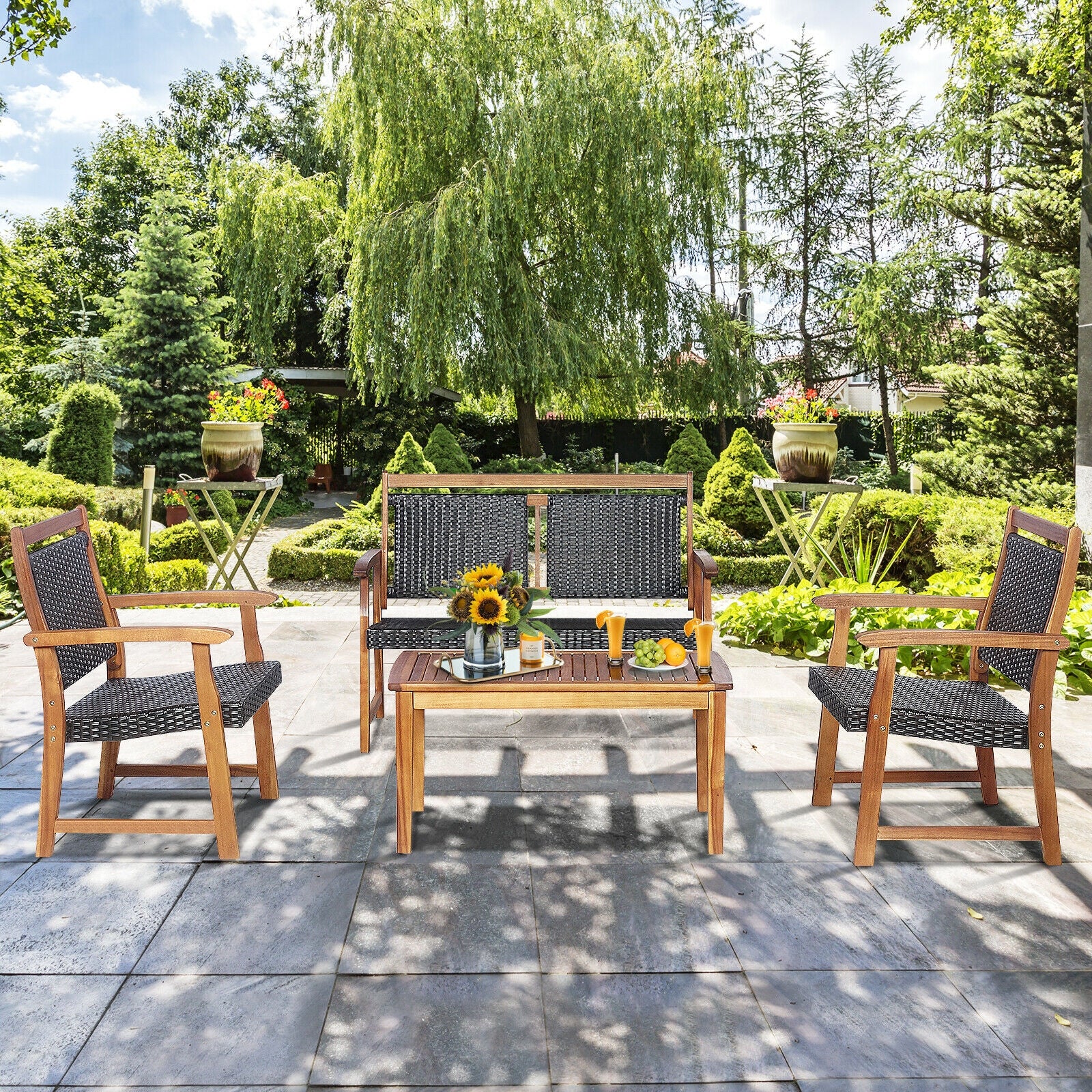 4-Piece Acacia Wood Frame Outdoor Rattan Sofa Set from Dream Yard Oasis ™, styled on a stone patio with a refreshing outdoor atmosphere.