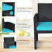 Close-up of the soft padded cushion and ergonomic design of the wide armrest and curved backrest in the Dream Yard Oasis 4-Piece Rattan Patio Furniture Set with Weather-Resistant Cushions & Tempered Glass Table - Turquoise.