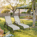 Adjustable Chaise Lounge Chair for Patio showcased in a serene outdoor setting with two chairs, ideal for relaxing in your garden or backyard.