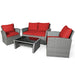 4-Piece Patio Rattan Furniture Set with Cushions, Table & Storage Shelf - Red. The elegant setup includes a loveseat and two armchairs with vibrant red cushions and a modern coffee table, ideal for outdoor gatherings and enjoying sunny days.