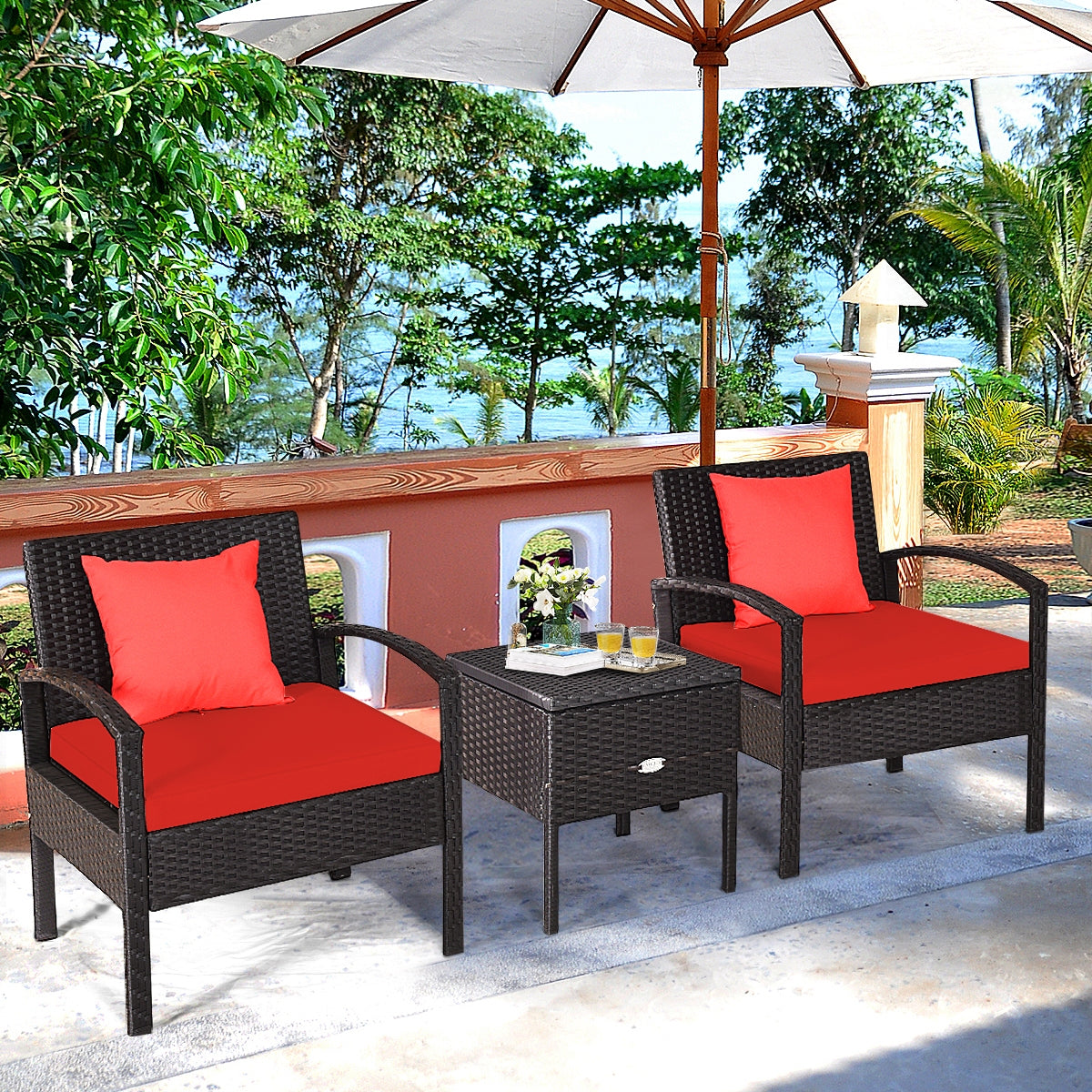Cozy 3 Piece PE Rattan Wicker Sofa Set displayed on a patio, showcasing its red cushions and elegant design near a sunny landscape.