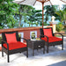 Cozy 3 Piece PE Rattan Wicker Sofa Set displayed on a patio, showcasing its red cushions and elegant design near a sunny landscape.
