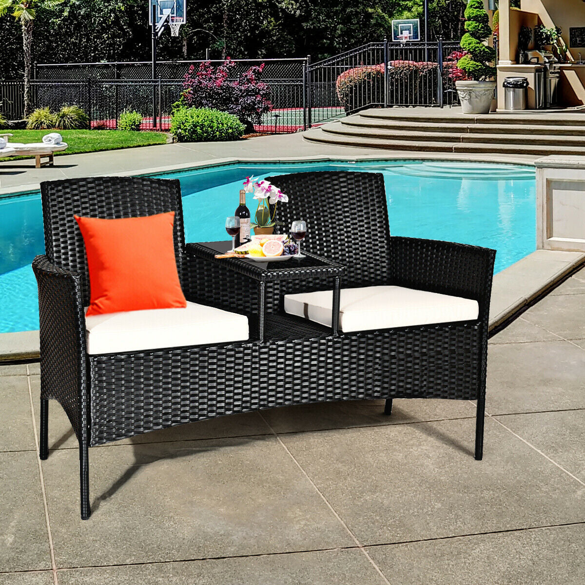 Dream Yard Oasis Wicker Patio Conversation Set by a poolside, ideal for summer gatherings with refreshing drinks displayed on the table.