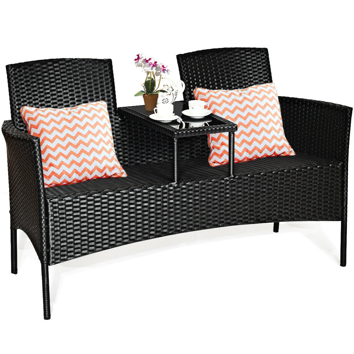 Dream Yard Oasis Wicker Patio Conversation Set with decorative cushions, set up for a cozy outdoor tea time, enhancing comfort and style.