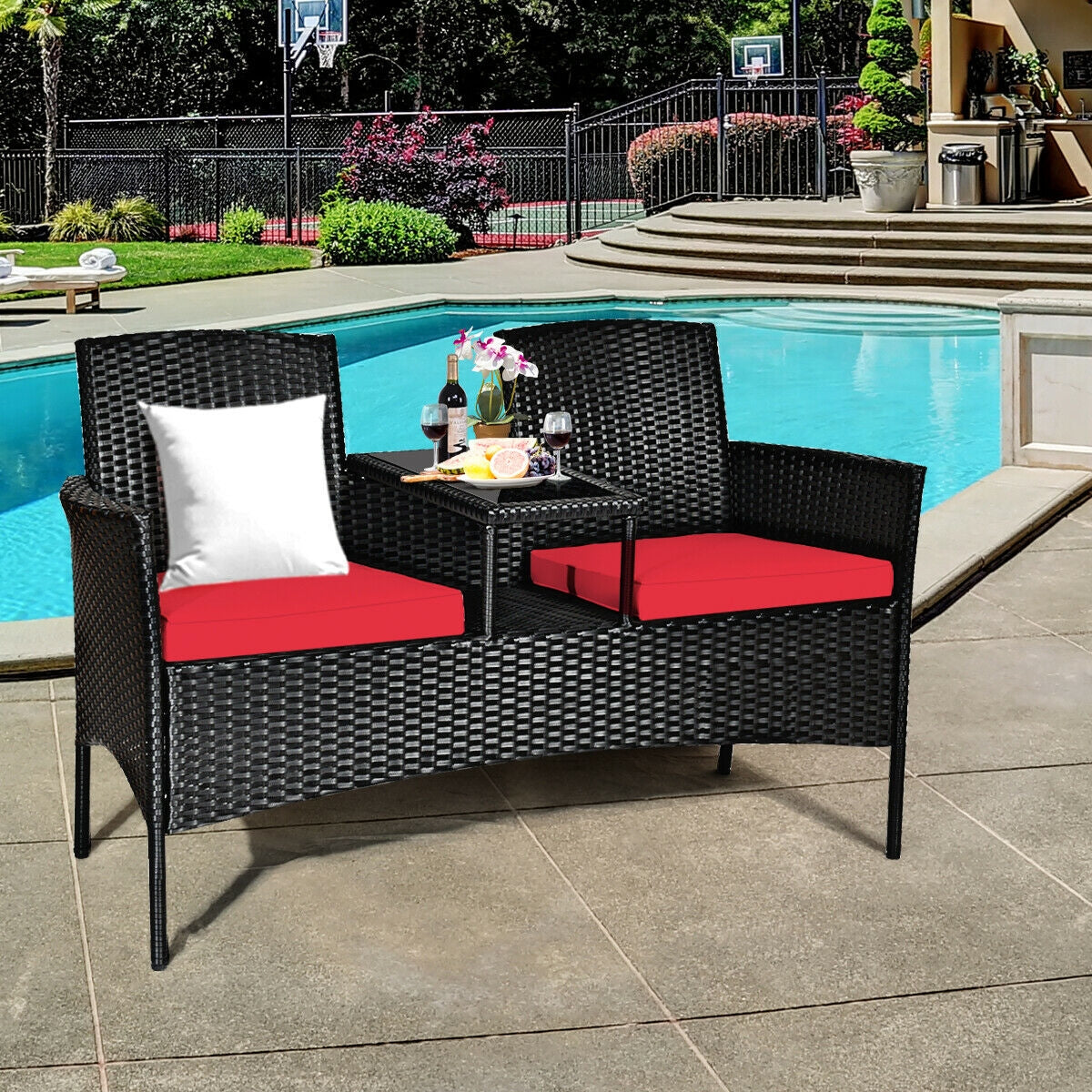 Relaxing 2-Piece Wicker Patio Conversation Set with Removable Cushions & Glass Table - Red, perfect for poolside gatherings with drinks and snacks.
