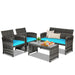 4-Piece Turquoise Rattan Patio Furniture Set with Cushions featuring a loveseat, two chairs, and a coffee table in a stylish outdoor setting.
