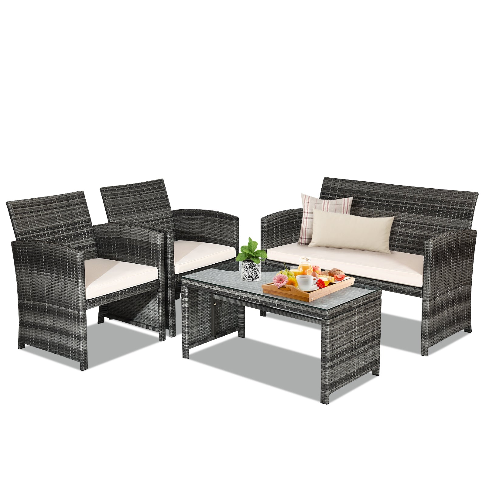 4-Piece White Patio Rattan Furniture Set with Cushioned Sofa and Glass Table - Durable & Stylish featuring a black rattan loveseat, two chairs, and a coffee table perfectly arranged for outdoor relaxation.