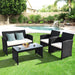 4-Piece Rattan Patio Furniture Set with Weather-Resistant Cushions & Tempered Glass Tabletop arranged in a lush backyard with a pool, featuring a loveseat and two single sofas.