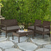 4-Piece Patio Rattan Furniture Set with Cushions, Loveseat, & Table - Brown Outdoor Bliss showcased in a lush garden, offering comfort and style for outdoor relaxation.