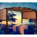 12' x 9' Outdoor Pergola with Retractable Canopy for Shade & Weather Protection, featuring a romantic setting by the beach with dining table and chairs.