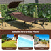 Patio Hanging Chaise Lounge Chair with Canopy, Cushion, Pillow & Side Storage - Brown by Dream Yard Oasis ™ in a backyard setting, showcasing its versatile usage.