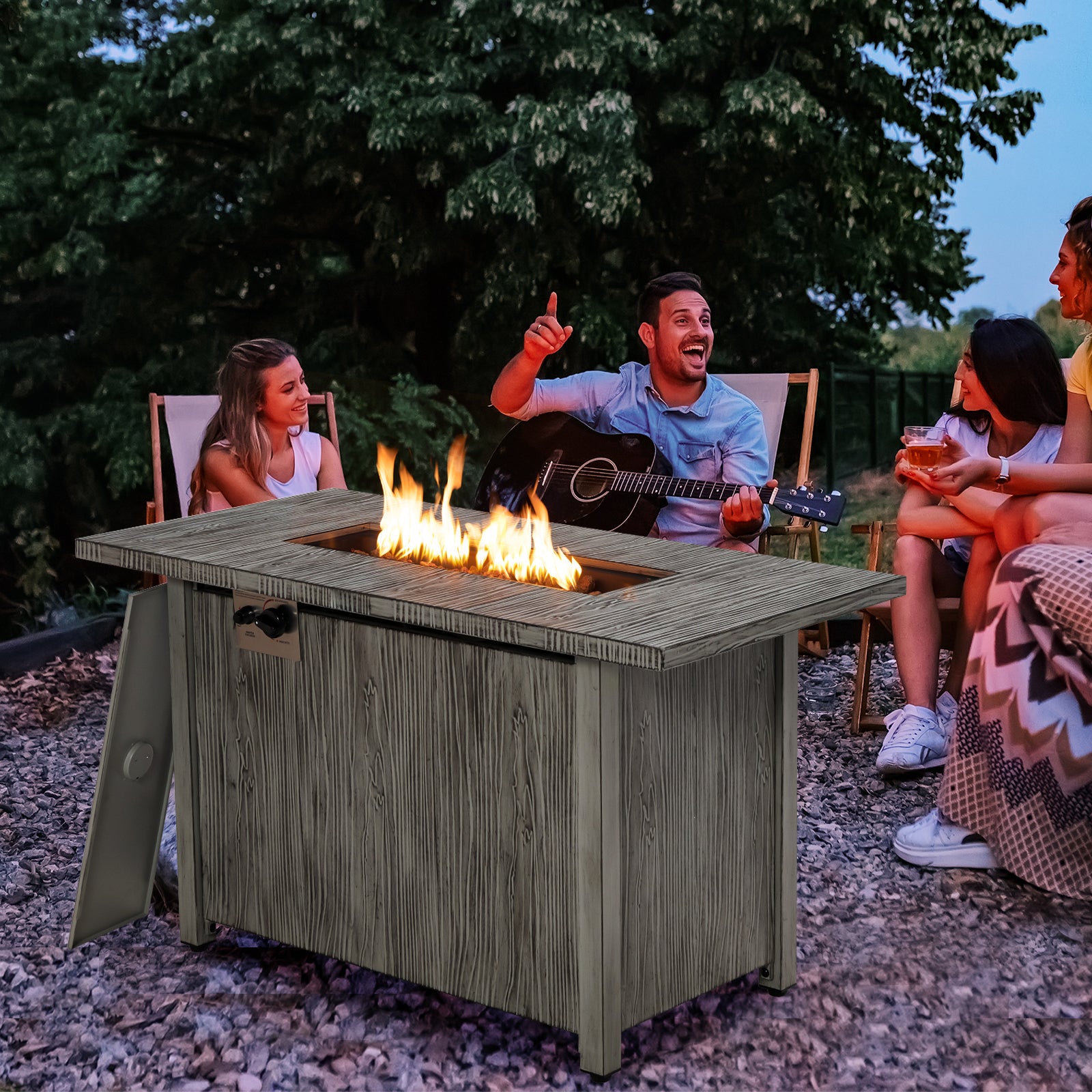 Outdoor gathering around the 43-Inch Gray Propane Fire Pit Table, featuring flames, friends enjoying music, and a cozy atmosphere with a 50,000 BTU heat output.
