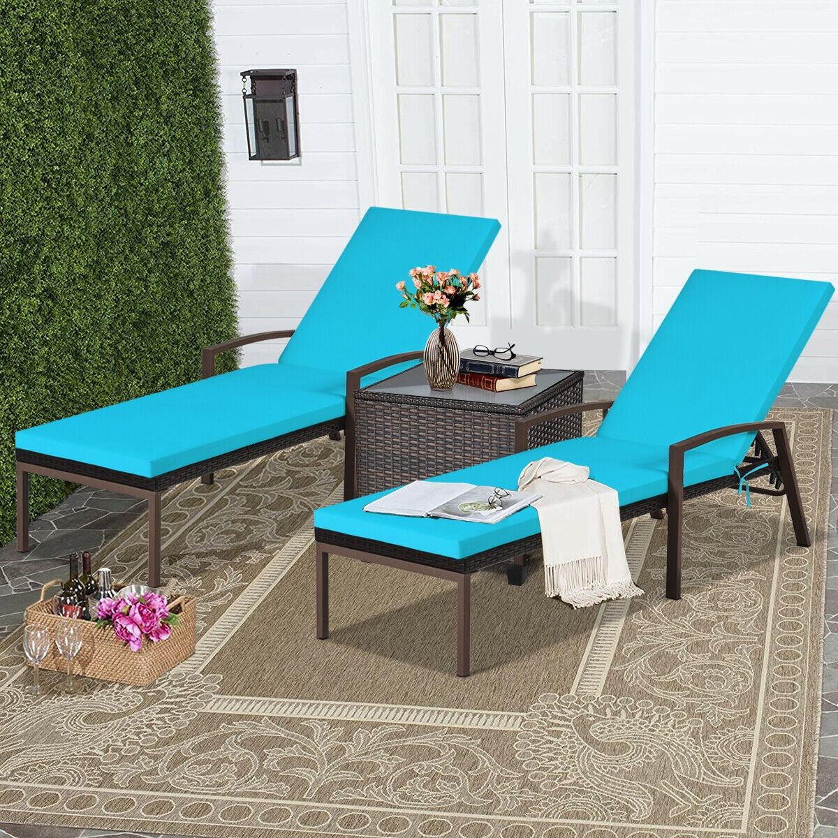 Stylish setup featuring the 2 Pieces Patio Rattan Adjustable Back Lounge Chair with Armrest and Removable Cushions in Turquoise, perfect for outdoor relaxation.