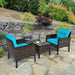 3-Piece Turquoise Outdoor Rattan Conversation Set with Cushions displayed outdoors, featuring two stylish chairs and a coffee table surrounded by greenery.