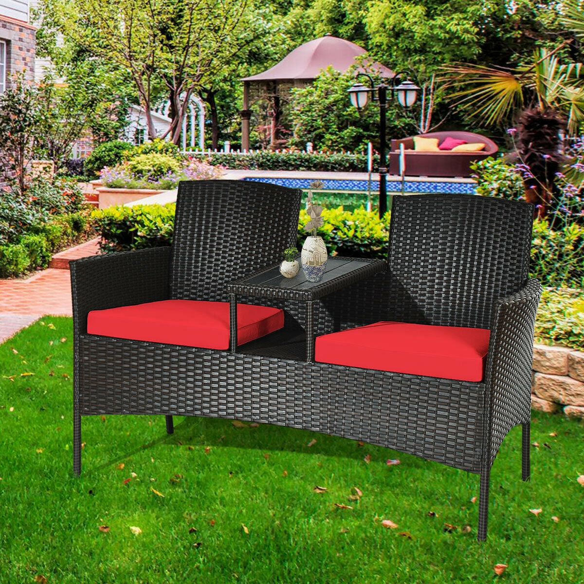 Modern 2-Piece Patio Conversation Set with Built-in Coffee Table & Thick Cushions - Red set in a lush garden, perfect for enhancing outdoor spaces while enjoying leisure time.