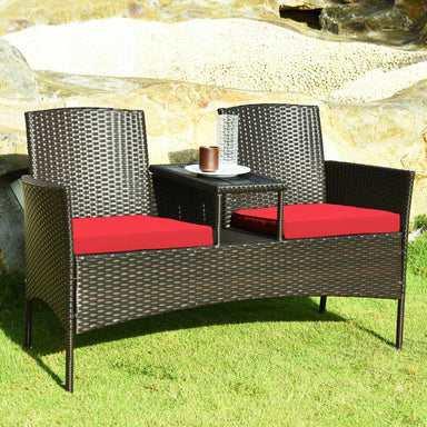 Modern 2-Piece Patio Conversation Set with Built-in Coffee Table & Thick Cushions - Red, displayed outdoors on grass with drinks on the coffee table, showcasing a cozy design.