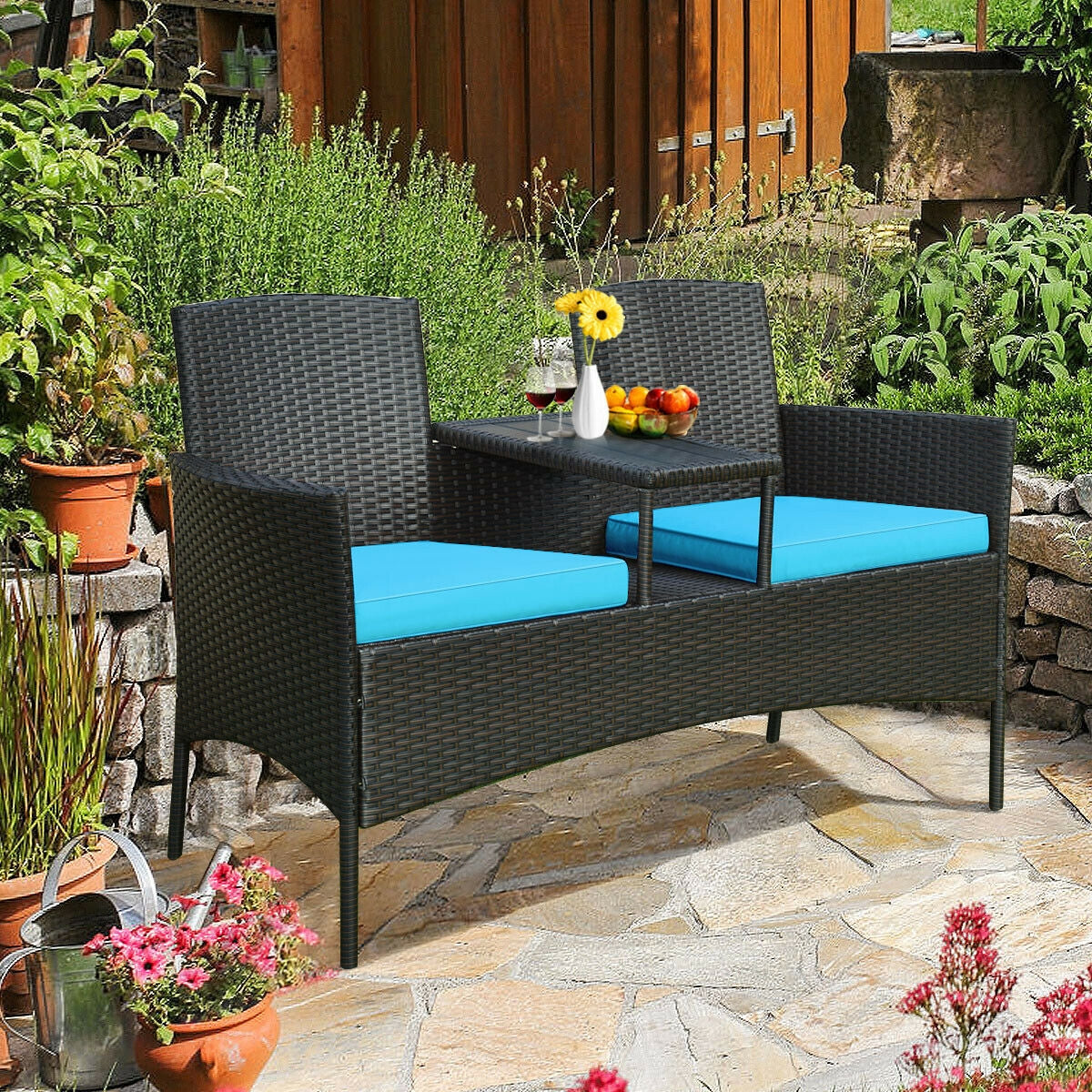 Modern 2-Piece Patio Conversation Set with Built-In Coffee Table & Cushions in Turquoise, showcasing a stylish outdoor setting with vibrant cushions and a cozy design.