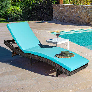 Folding Adjustable Rattan Chaise Lounge Chair with Thick Cushion - Turquoise, 5-Level Recline, 400 lbs Capacity beside a swimming pool with a drink on a table.