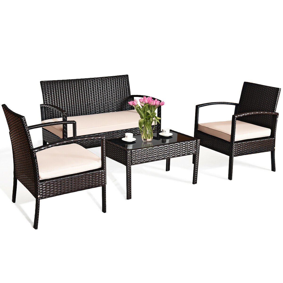 Close-up view of the 4-Piece Outdoor Patio Rattan Conversation Set featuring a Loveseat, 2 Single Sofas & Glass Table with cushions and flowers.