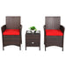 3-Piece Red Cushioned Patio Rattan Furniture Set with Glass Tabletop for Outdoor Living arranged with chairs and a side table featuring red cushions and a small plant decoration.
