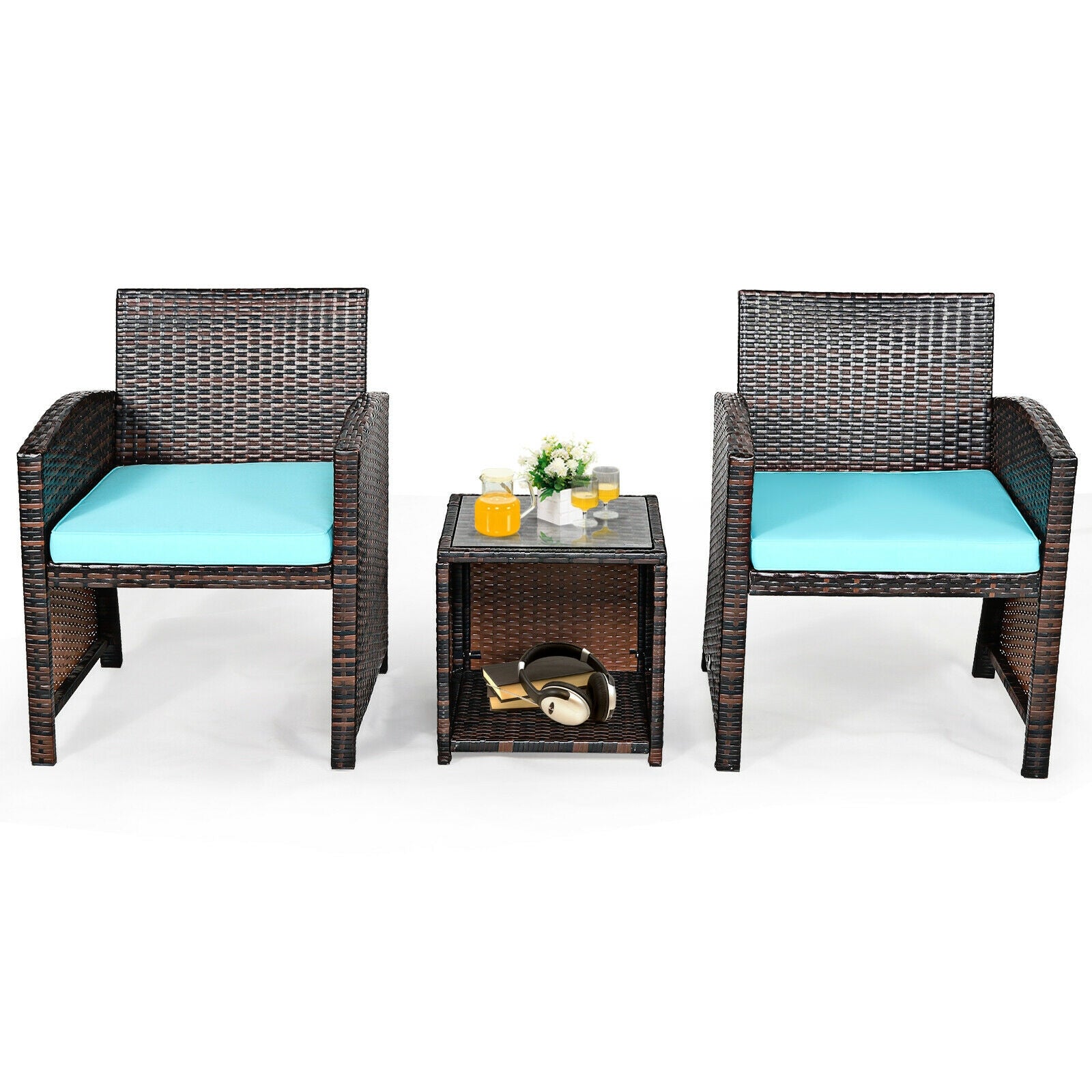 Casual display of the 3-Piece Outdoor PE Rattan Wicker Furniture Set with Turquoise Cushions & Coffee Table, featuring two chairs and a stylish table with refreshments.