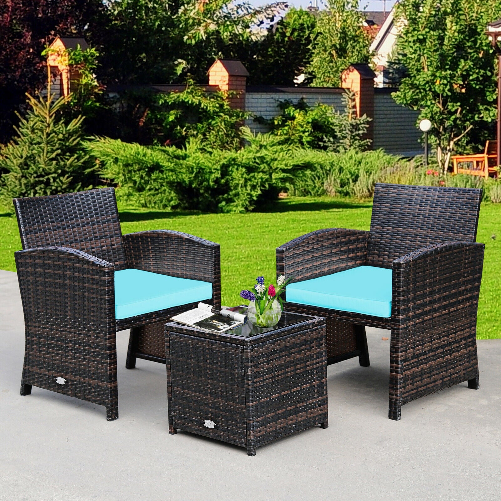 3-Piece Outdoor PE Rattan Wicker Furniture Set with Turquoise Cushions & Coffee Table in a lush garden setting, showcasing its stylish and inviting design.
