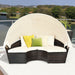 Spacious 5-Piece Patio Round Daybed Set with Canopy, Cushions & Adjustable Coffee Table from Dream Yard Oasis ™, displayed on a balcony with comfy cushions and a protective canopy.