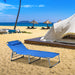 Lightweight Folding Chaise Lounge Chair with 5 Positions & Face Hole - Blue Outdoor Essential set up on a sunny beach with a tent and beach chairs in the background.