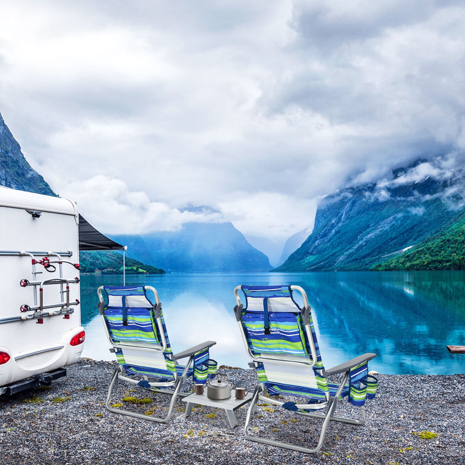 Dream Yard Oasis 2-Pack 5-Position Folding Beach Chairs with Table situated by a lake, showcasing the stylish blue and green design, ideal for camping and outdoor adventures.