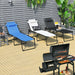 Multi-Purpose Foldable Recline Lounge Chair with 4-Position Backrest & 2-Position Footrest - Black, displayed in a garden setting with multiple lounge chairs and a grill.