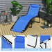 The Dream Yard Oasis™ Foldable Recline Lounge Chair featuring a removable headrest and anti-skid footpads, set on a stylish patio with greenery, perfect for outdoor relaxation.