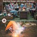 Social gathering around the 32-Inch Square Propane Fire Pit Table with Lava Rocks, highlighting its dust-free design and ease of use.