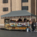 10x20 Feet Adjustable Heavy Duty Folding Canopy Shelter with Carry Bag - Gray, Water Resistant, set up as a shade over a food cart at an outdoor event.