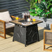 28-inch 40,000 BTU Propane Gas Fire Pit Table with Cover, relaxing outdoor setting featuring comfortable chairs, drinks, and dessert, designed for cozy gatherings and stylish patio experiences.