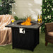 Beautiful outdoor setting featuring the 32-Inch Propane Fire Pit Table with Lava Rocks in use, flames glowing amidst drinks and cozy decor.