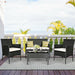4-Pc Outdoor Patio Rattan Sofa Set with Cushions displayed on a sunny balcony, featuring black wicker chairs, a glass table, and stylish striped cushions. Perfect for outdoor relaxation.